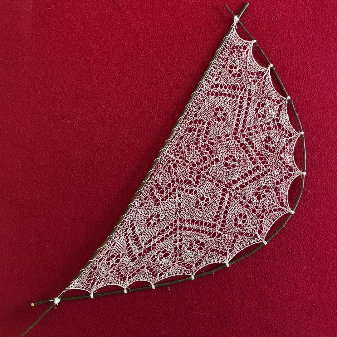 Shetland lace, made from yarn hand spun from local sheep, mounted on cuttings from Susan’s orchard